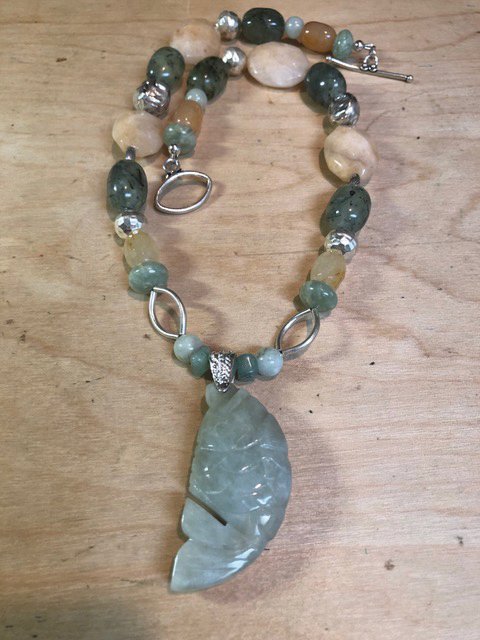 Jade pendant with multiple jade beads, prehnite, sterling beads and clasp by Judith Komishane.